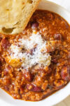 bowl of chile with buttered bread