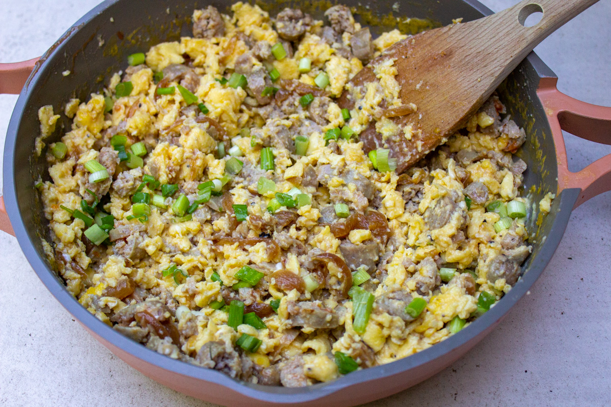 egg sausage onion mixture in skillet
