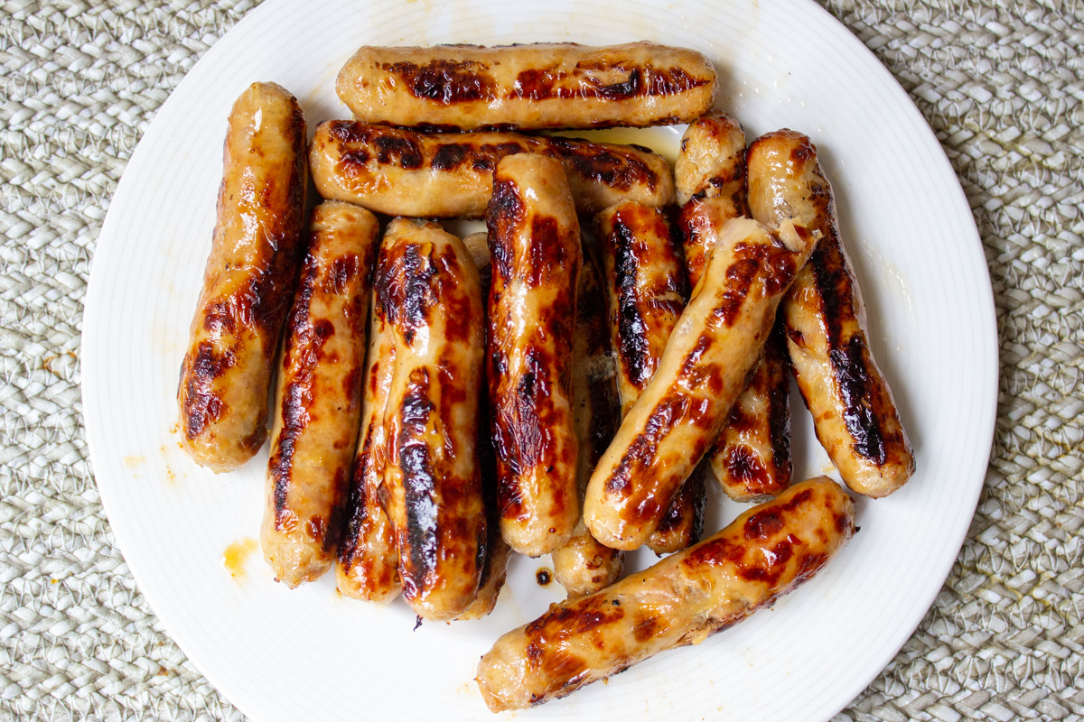 cooked sausage links in a bowl
