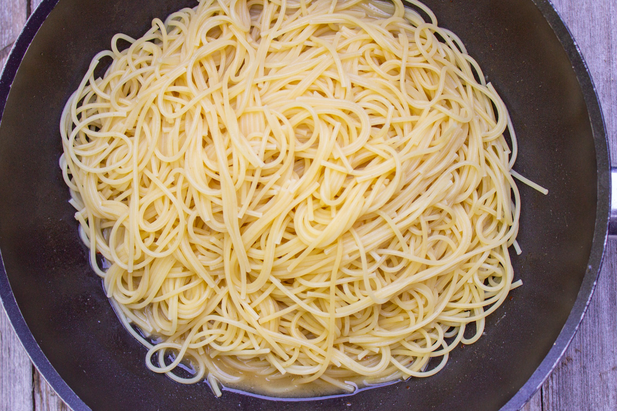 cooked and drained pasta in pot