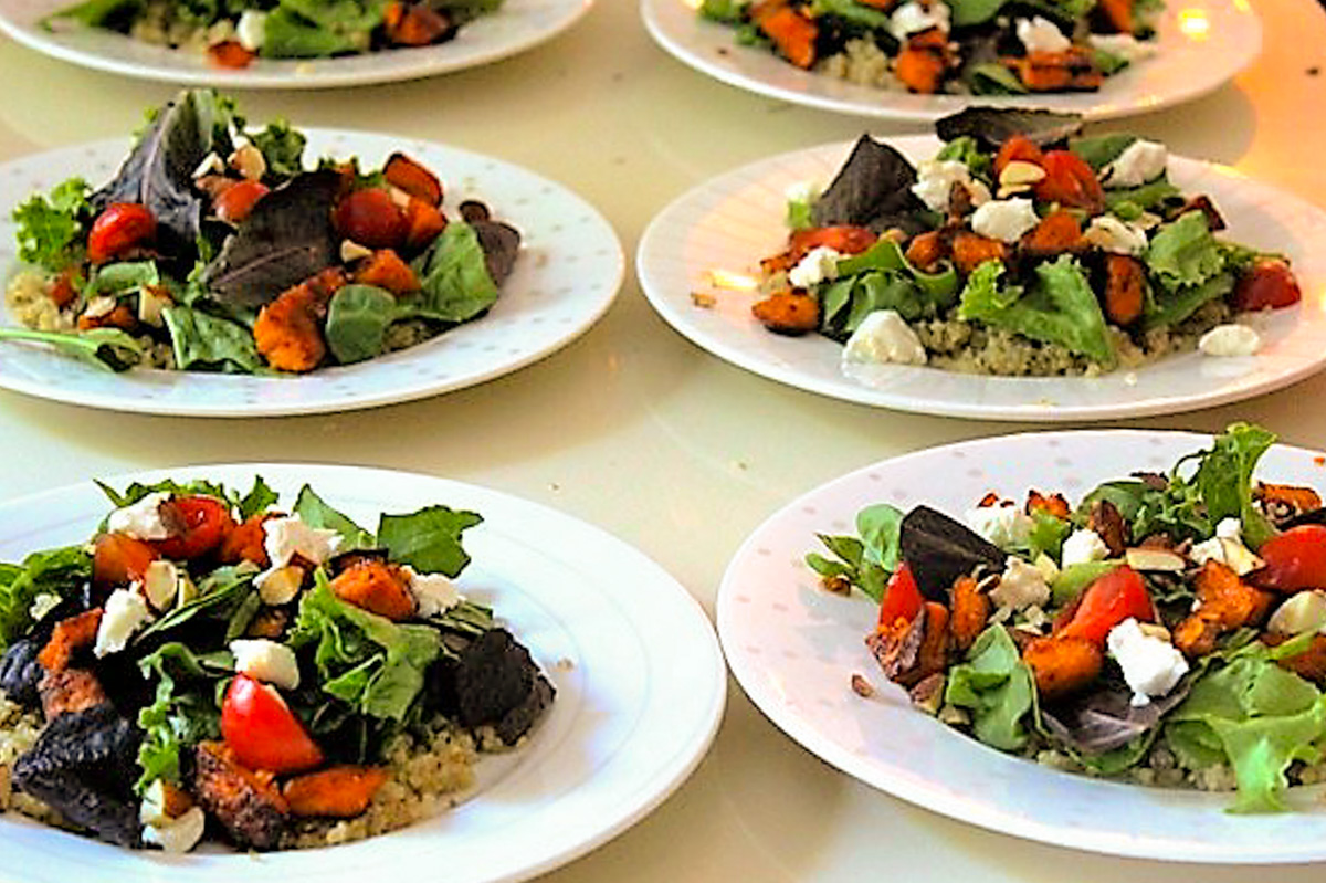 6 plates of sweet potato and greens salad