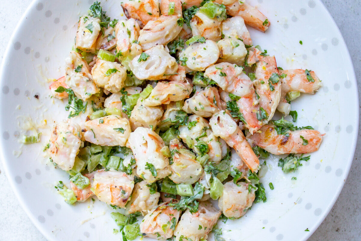 shrimp salad in a white bowl