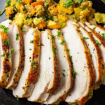 turkey sliced representing Thanksgiving recipes