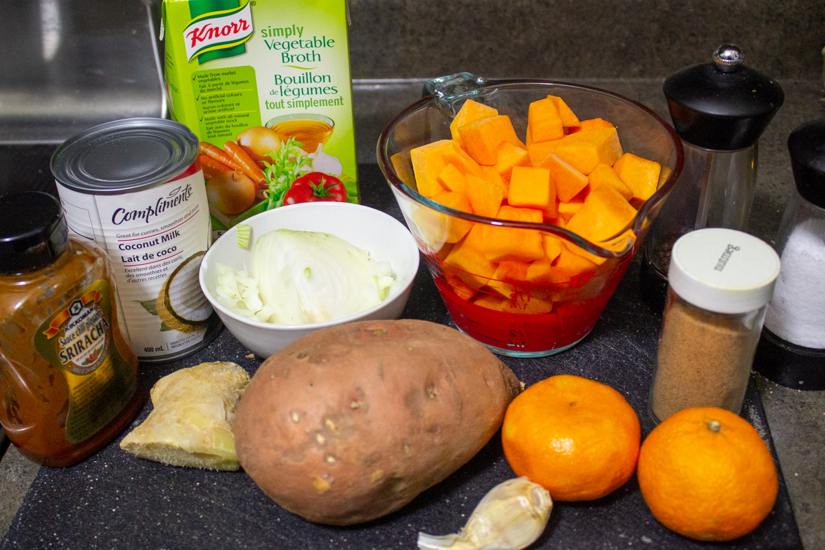cubed squash, sweet potato, mandarins, ginger, garlic, chopped onions, veggie broth, oil, coconut milk, nutmeg 