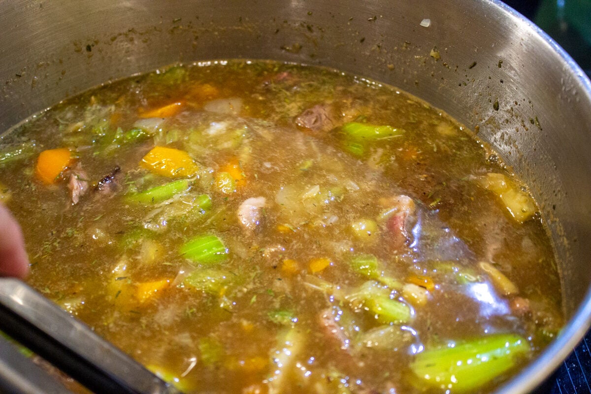 beef barley soup ingredients in pot