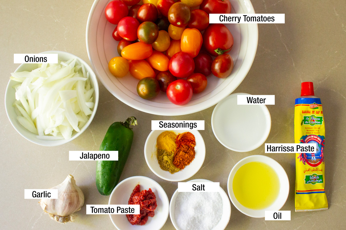 cherry tomatoes, oil, onions, garlic, jalapeno, seasonings, water, tomato paste, harissa paste