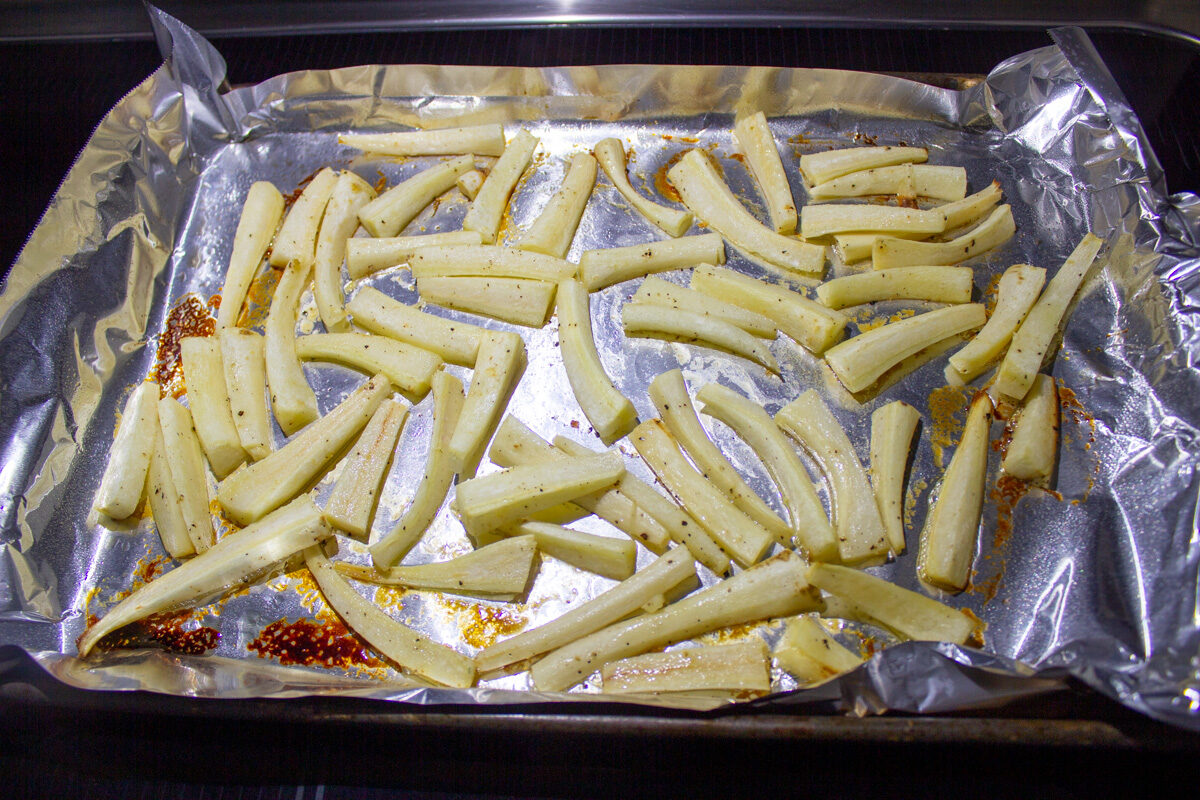 parsnips laid on foil lined pan in single layer