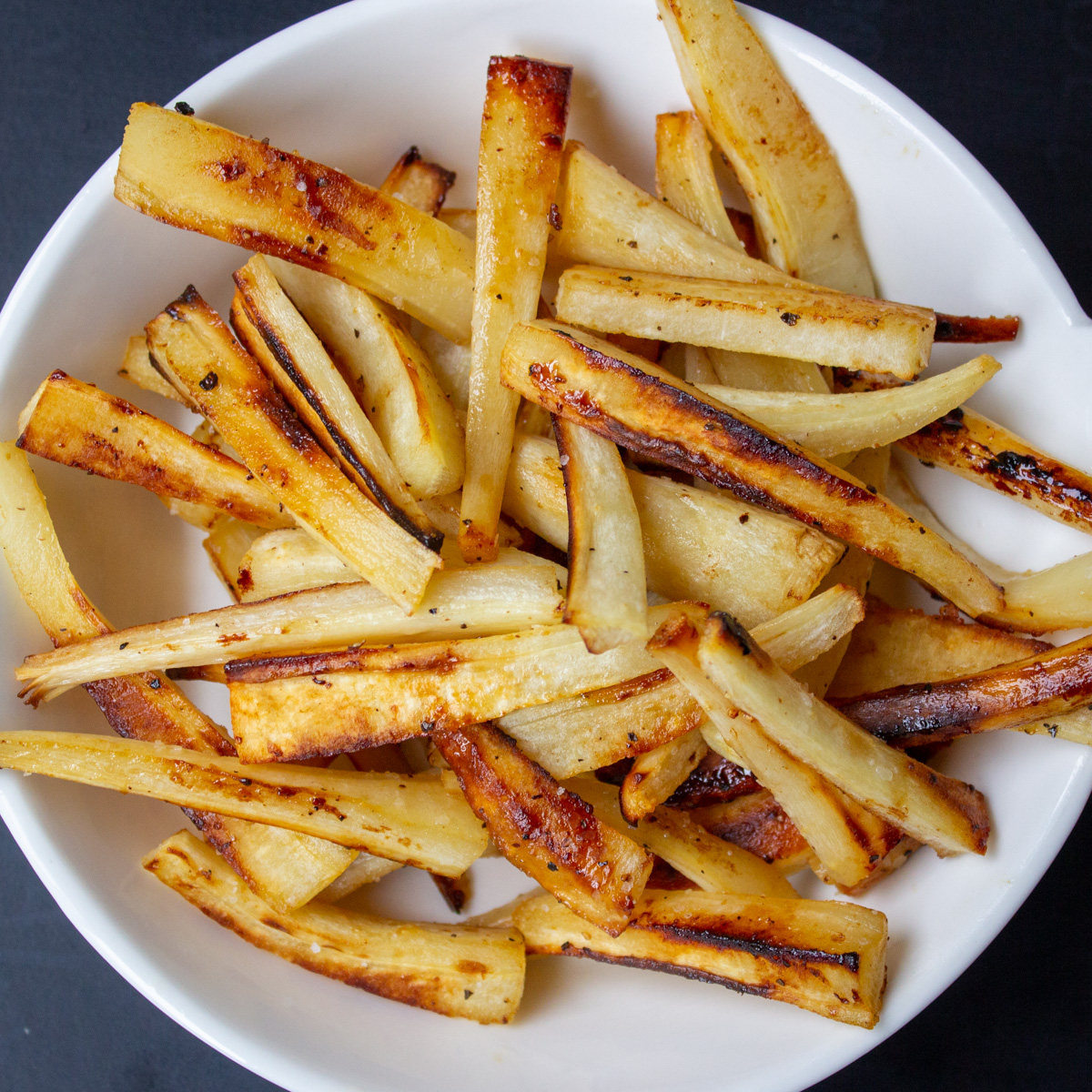 bowl of honey roasted parsnips