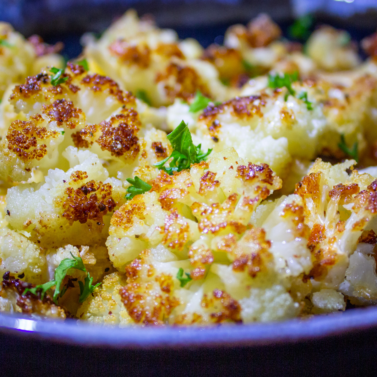 Baked Cauliflower With Cheese and Brown Crispy Edges