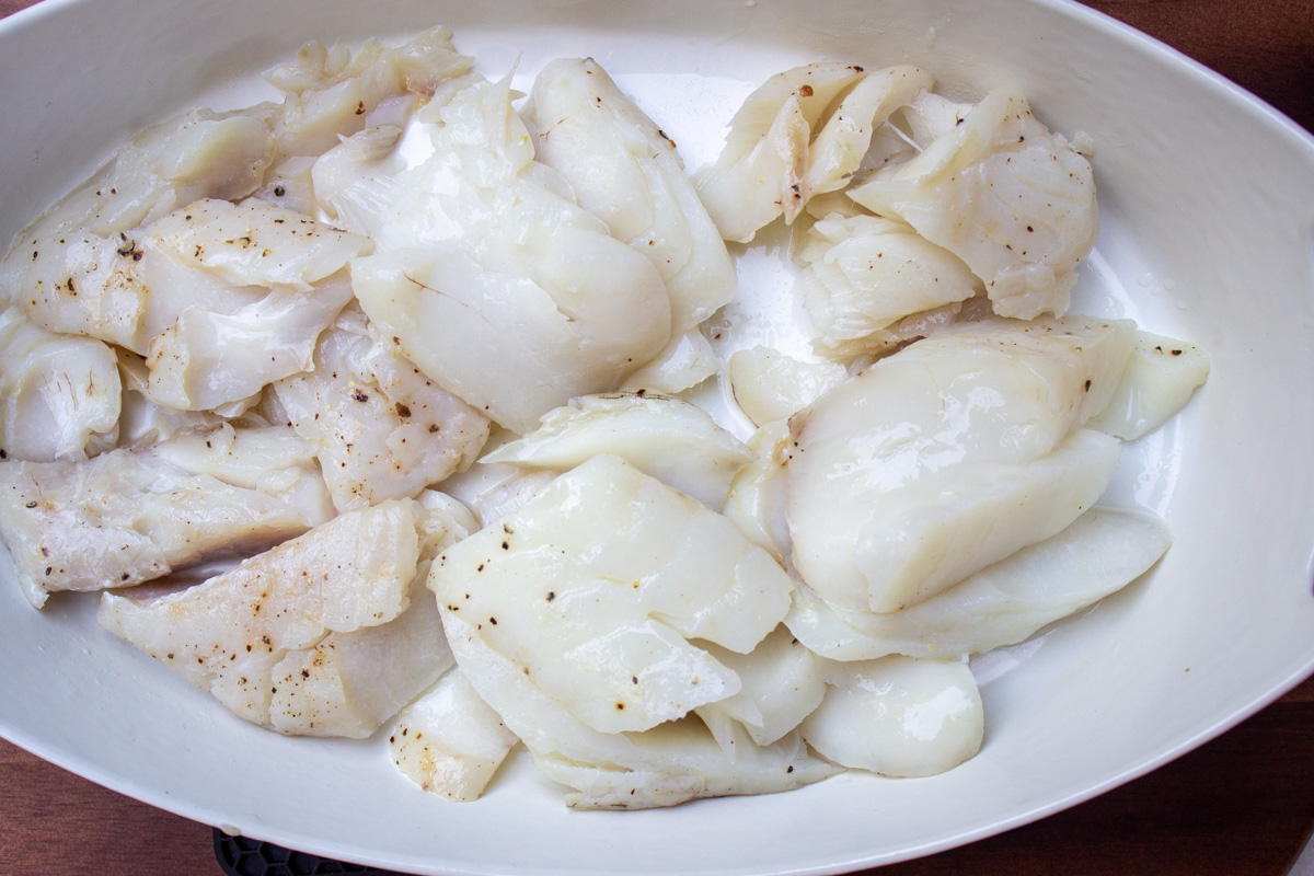 chunks of sous vide cod in casserole dish