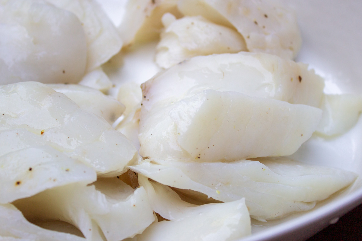 close up of chunks of sous vide cod in dish