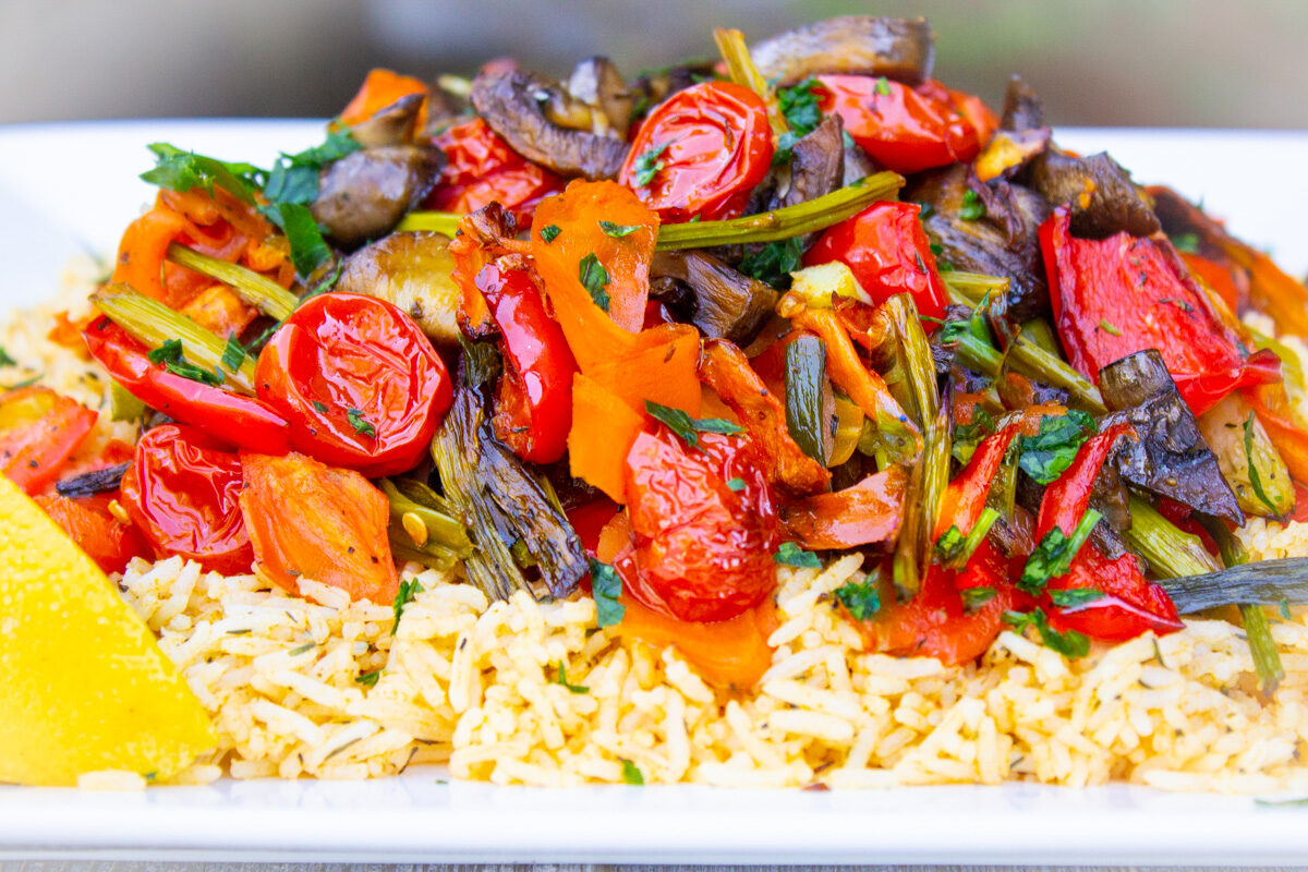 roasted veggies on top of seasoned rice.