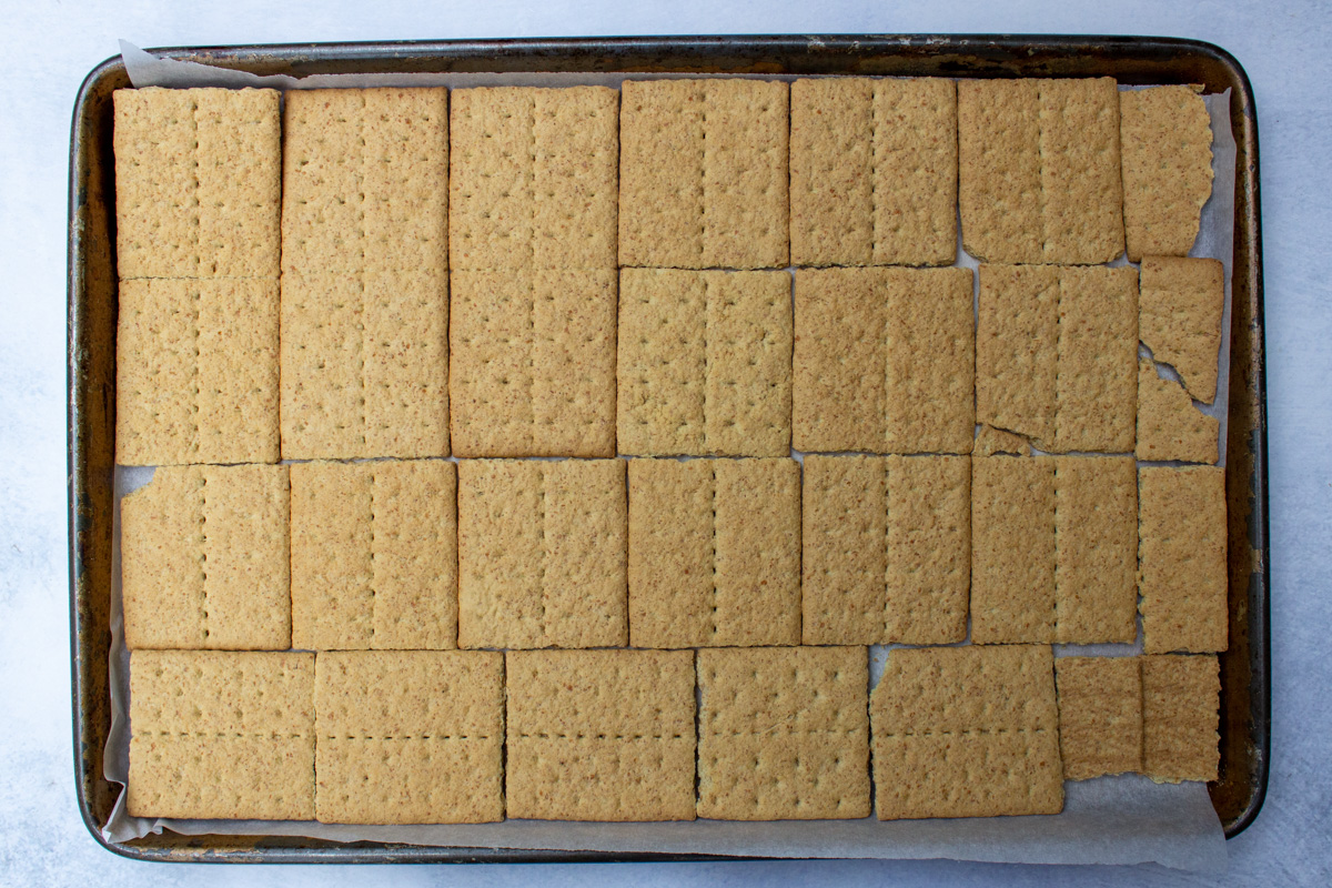 graham crackers covering bottom of a sheet pan in single layer