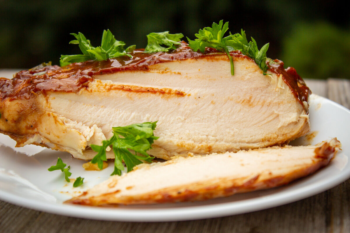 balsamic glazed chicken breast cut open on plate