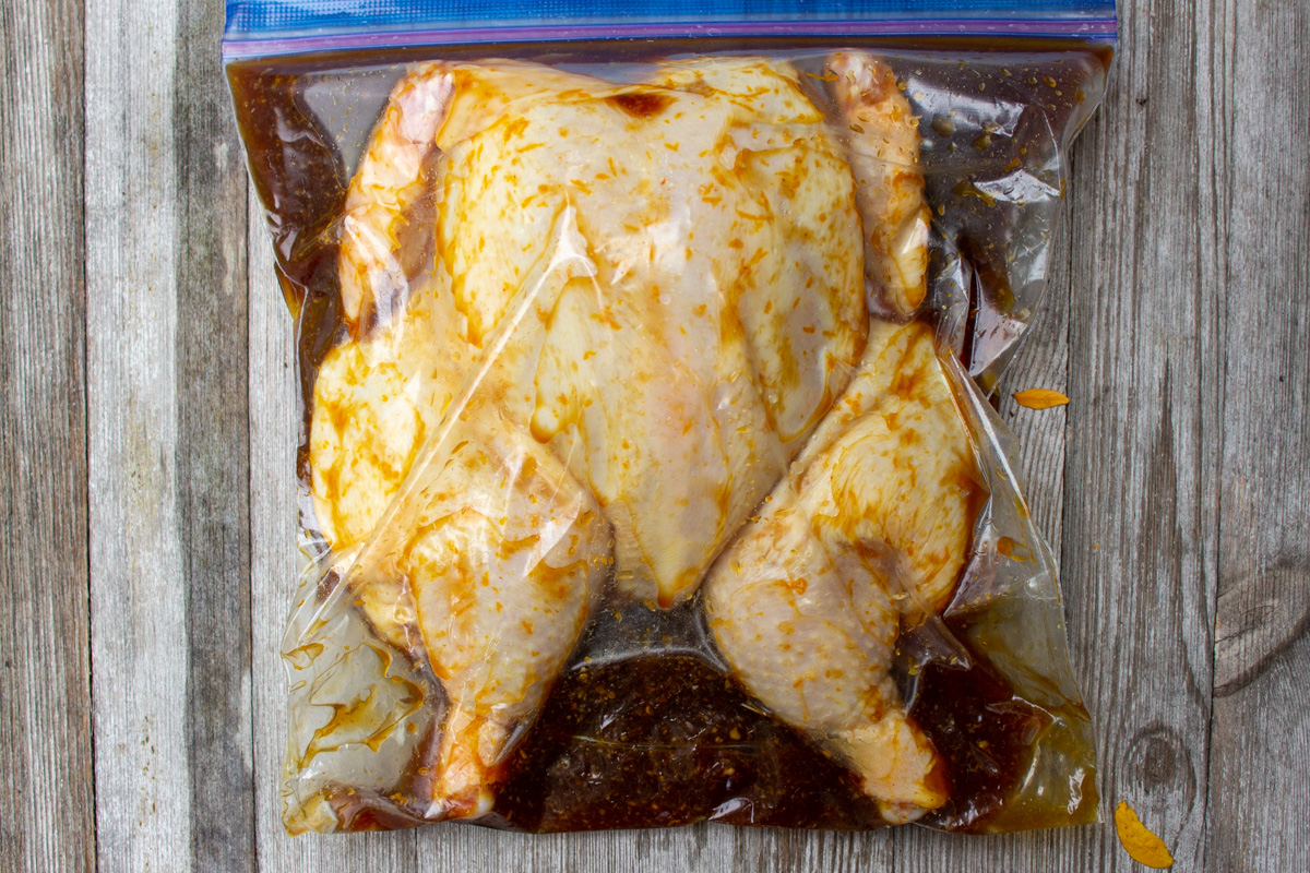 butterflied chicken marinated in ziploc bag.
