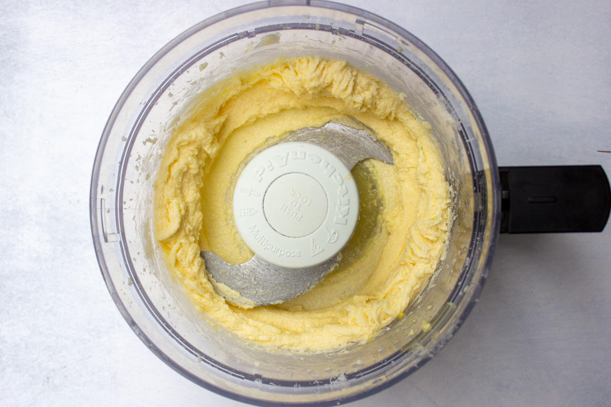 creamed butter and sugar in food processor bowl