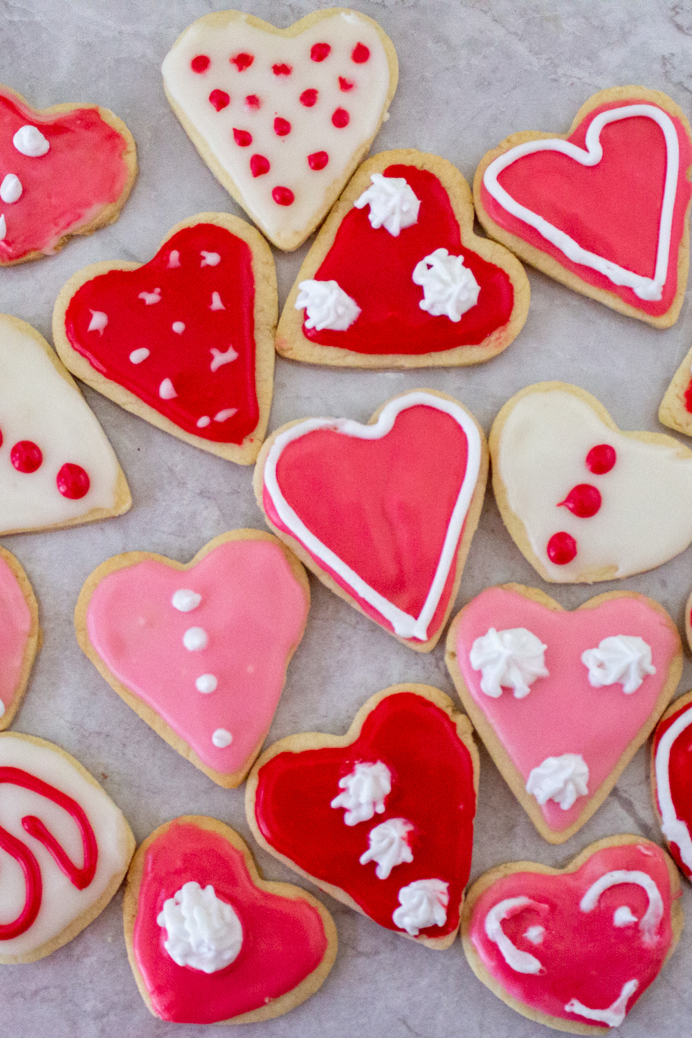 heart cut out cookies decorated on plate