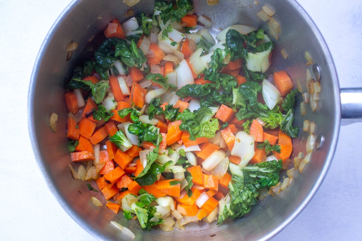 veggies and onions in pot