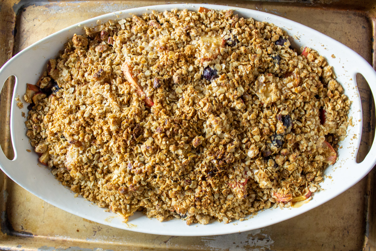 baked apple and blueberry crumble in baking dish