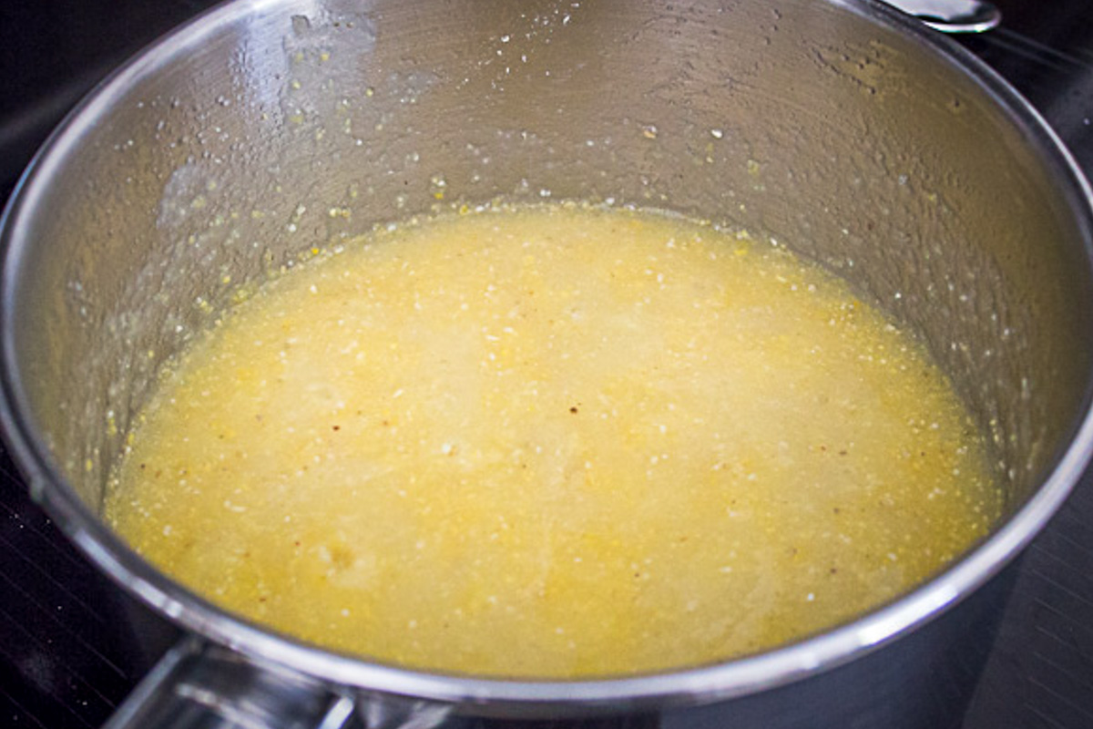 polenta and water in pot.