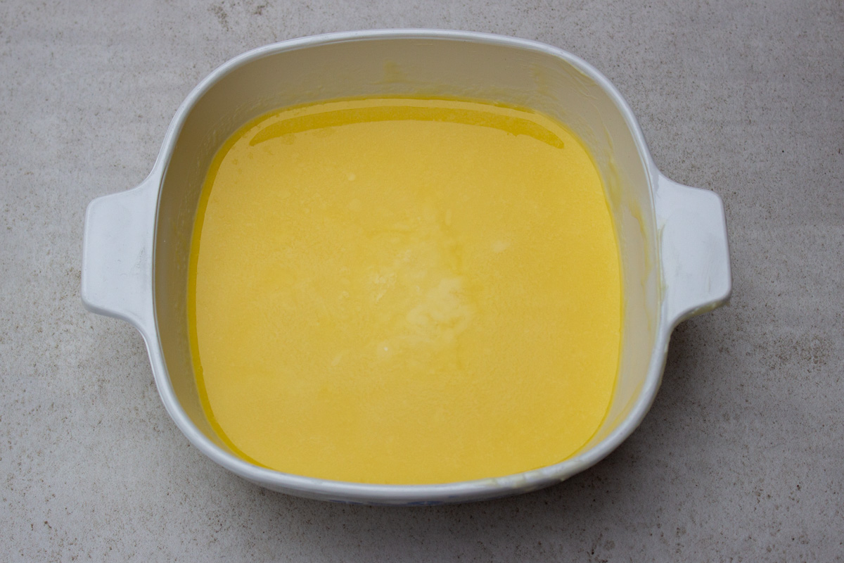melted butter and white chocolate in dish.