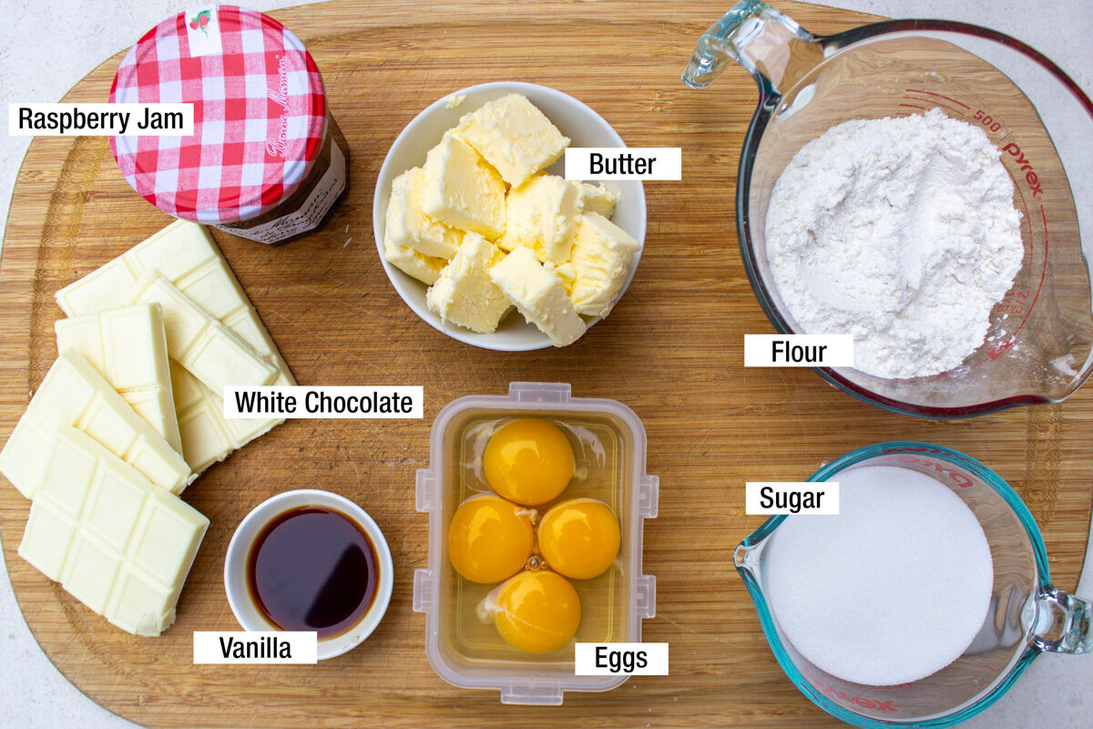 white chocolate, eggs, sugar, flour, vanilla, butter, raspberry jam