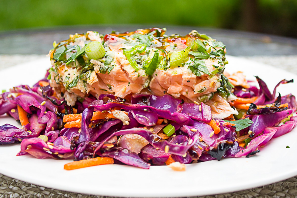 grilled cabbage slaw topped with salmon