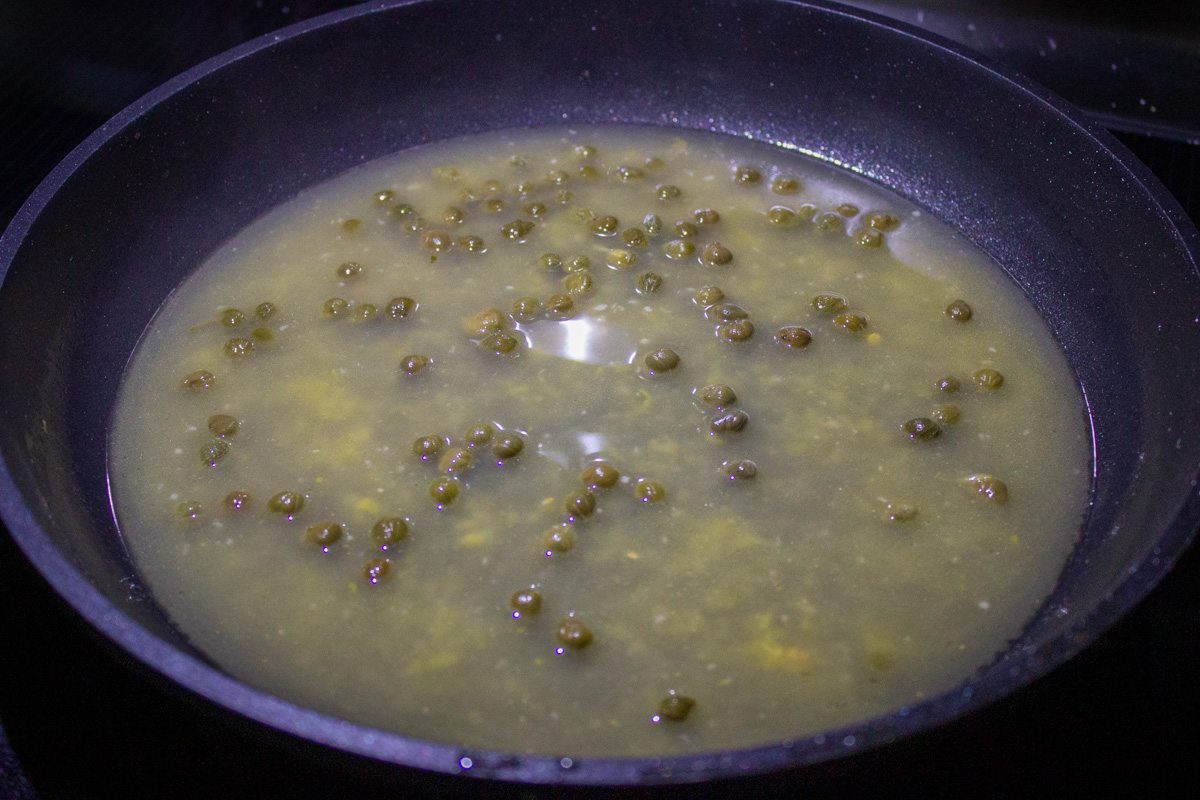 piccata sauce in pan.