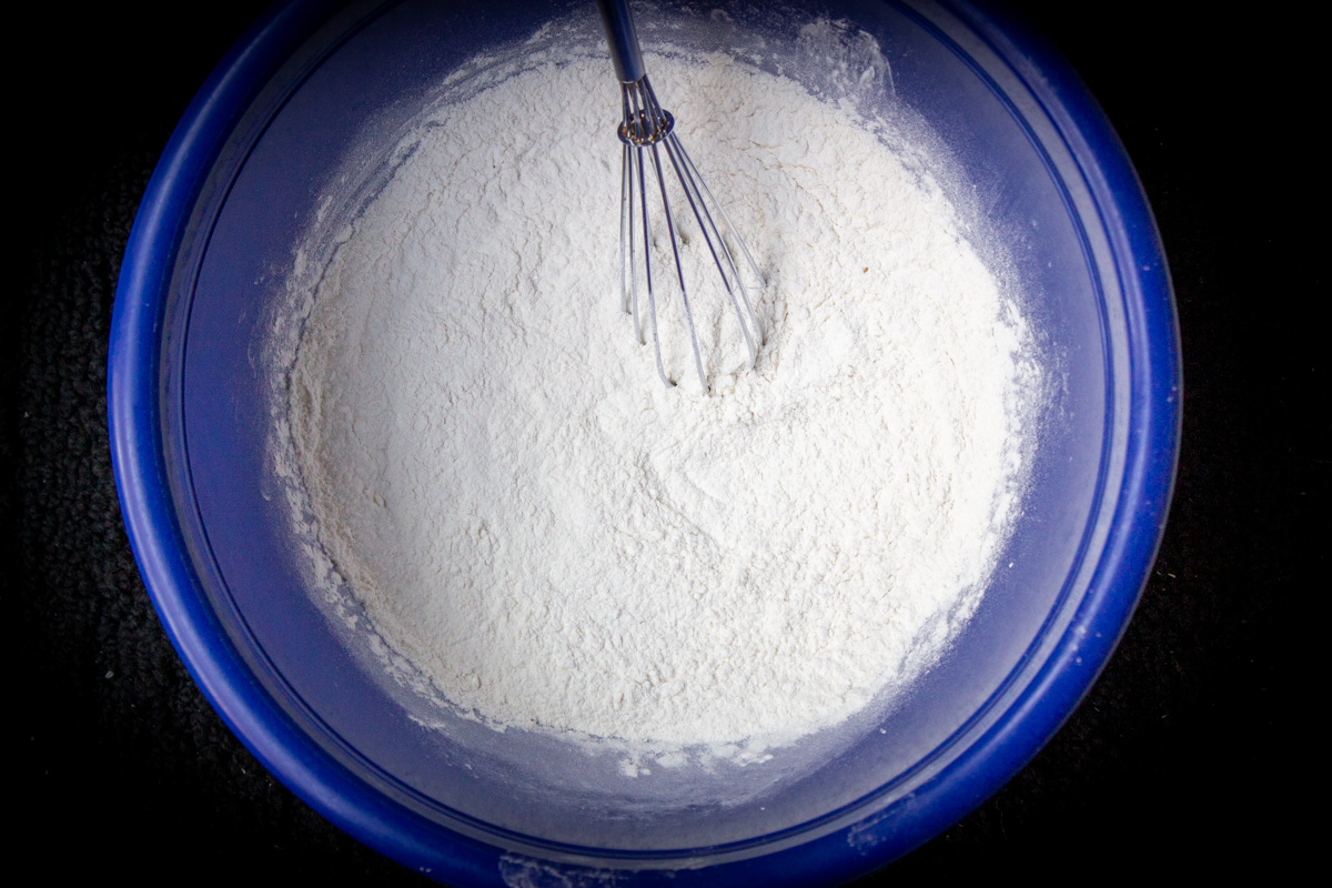 dry ingredients except sugars in mixing bowl.