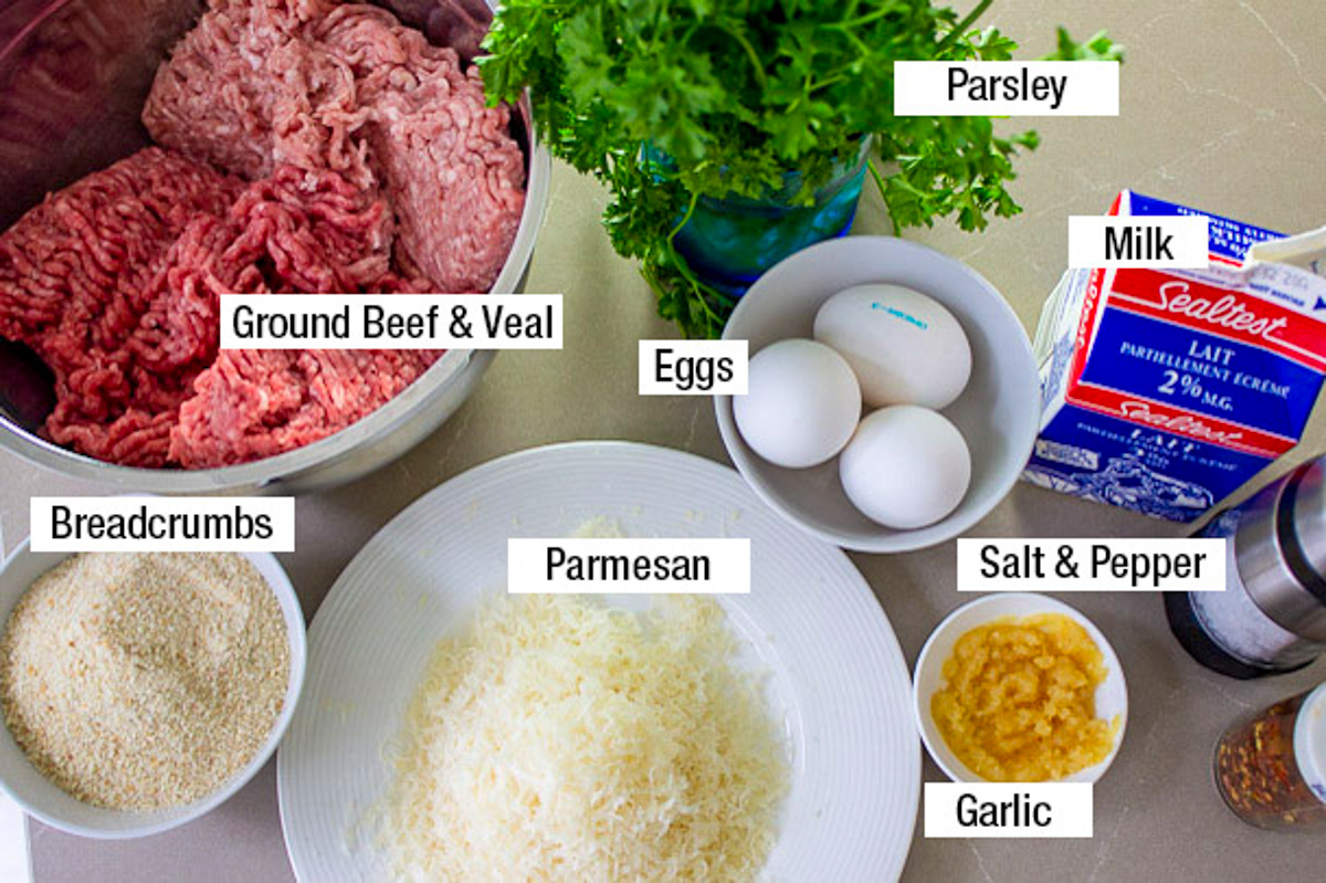 ground beef and veal, eggs, parmesan, garlic, breadcrumbs, milk, parsley, seasonings.