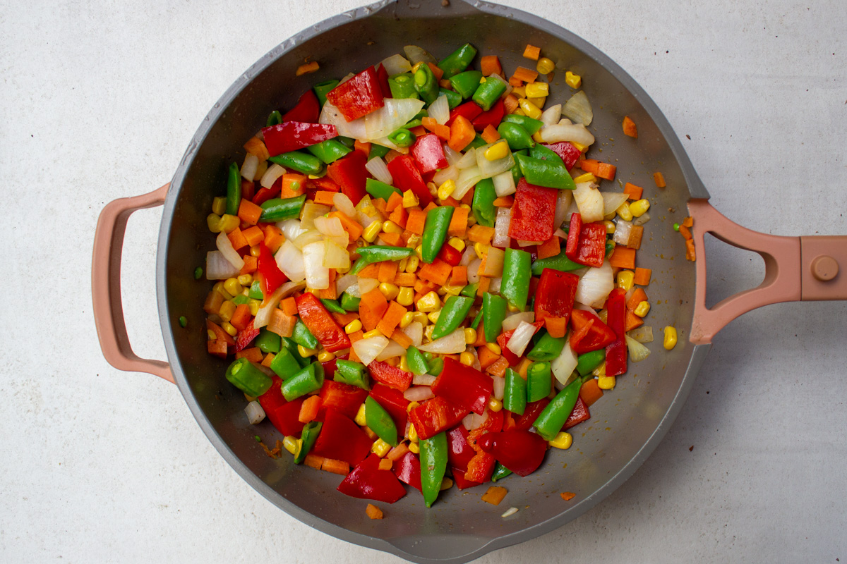 sauteed vegetables in skillet.