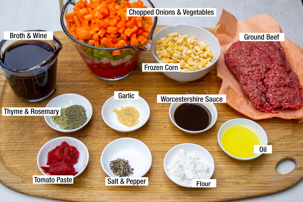 ground beef, chopped veggies, thyme, rosemary, salt, pepper, tomato paste, corn, oil, worcestershire, garlic, flour.
