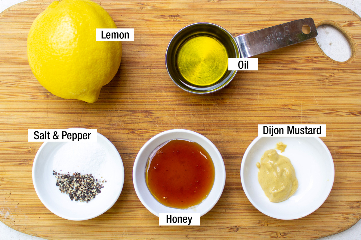 lemon, oil, honey, Dijon, salt, pepper.
