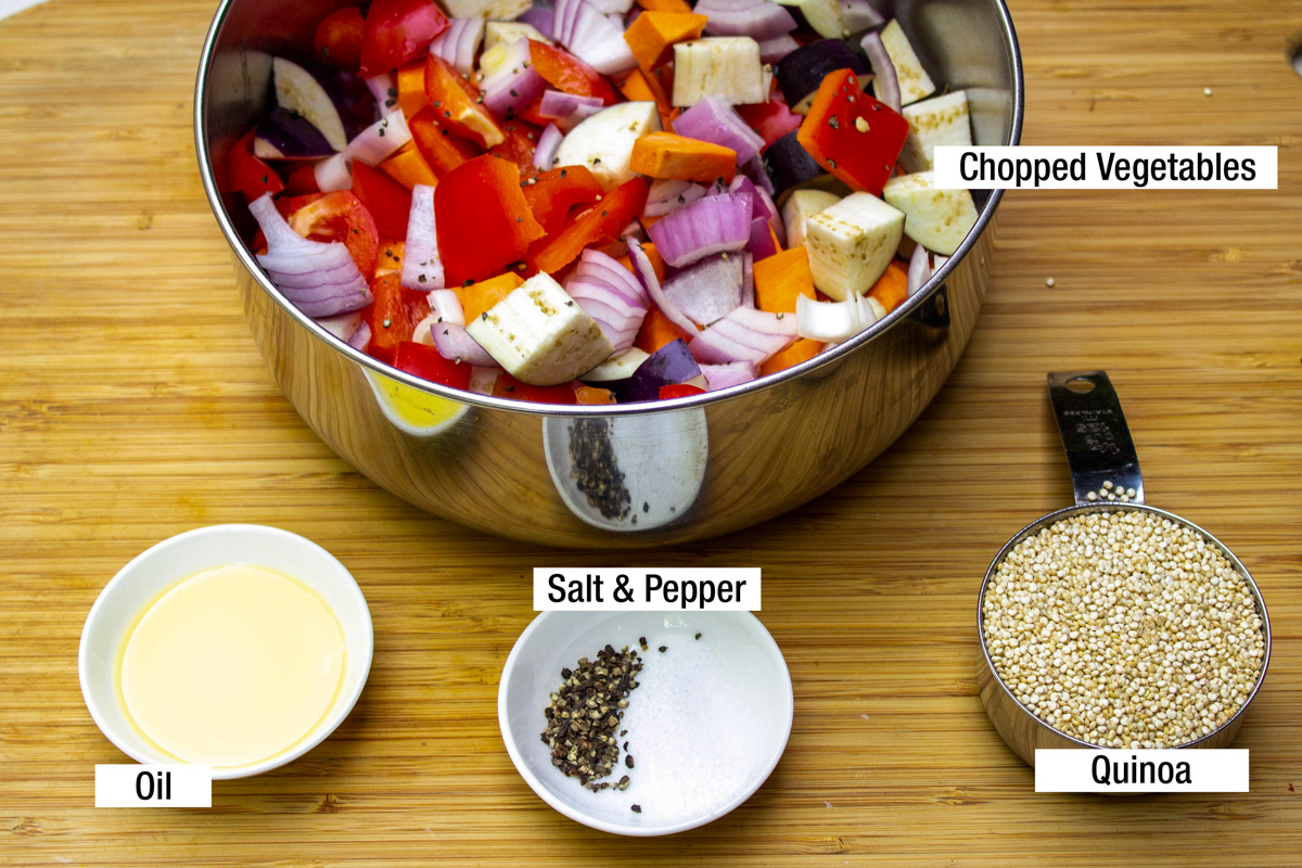 chopped vegetables in bowl, oil, salt, pepper, dry quinoa.