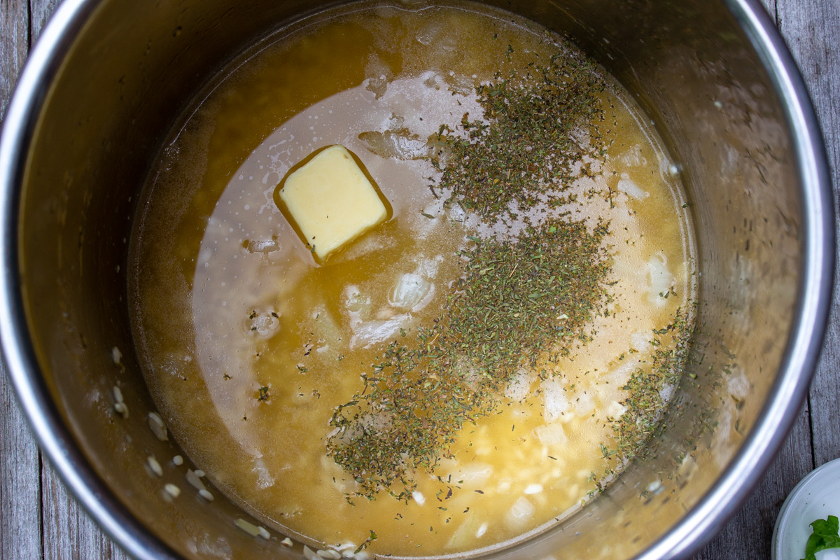 liquids, rice and seasonings in instant pot.