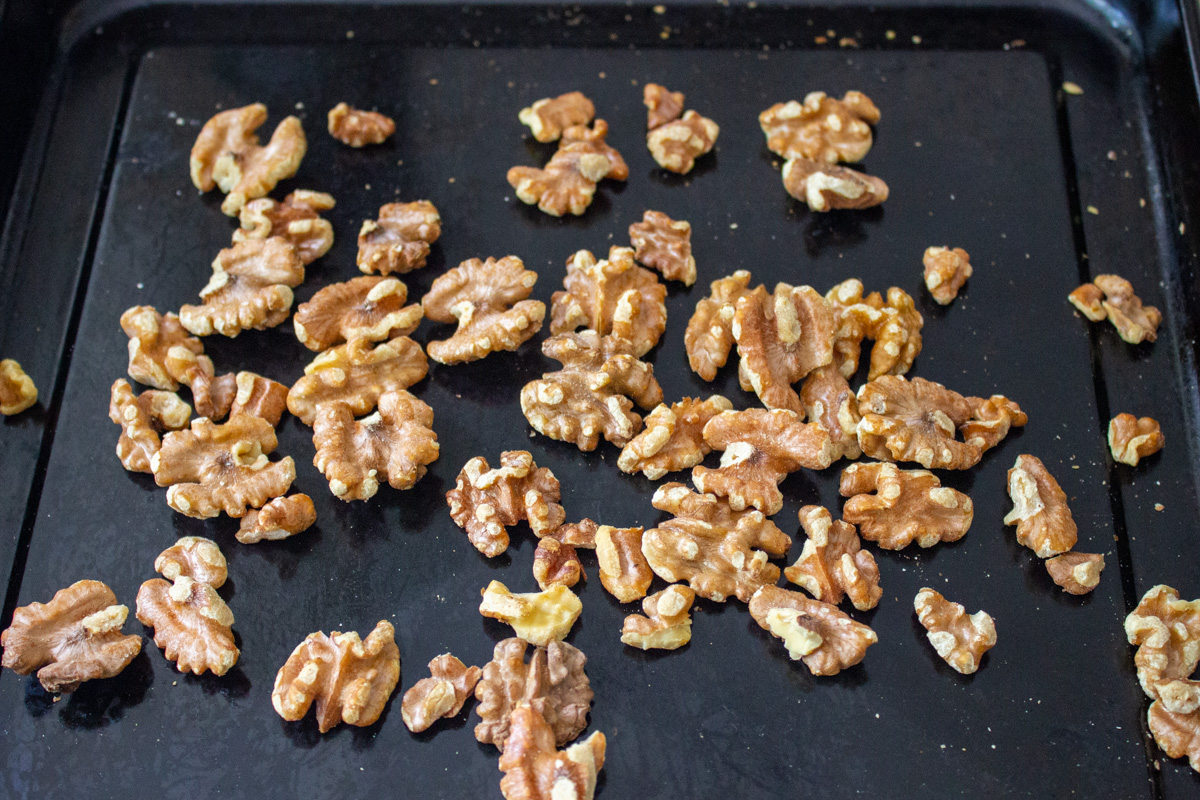 toasted walnuts in pan.