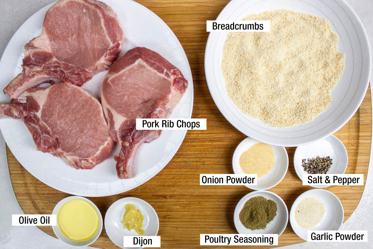 3 pork rib chops, breadcrumbs, olive oil, Dijon, garlic powder, onion powder, salt, pepper, poultry seasoning.