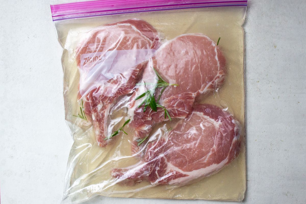 pork chops brining in ziplock bag.