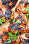 grilled chili lime chicken wings on cutting board.