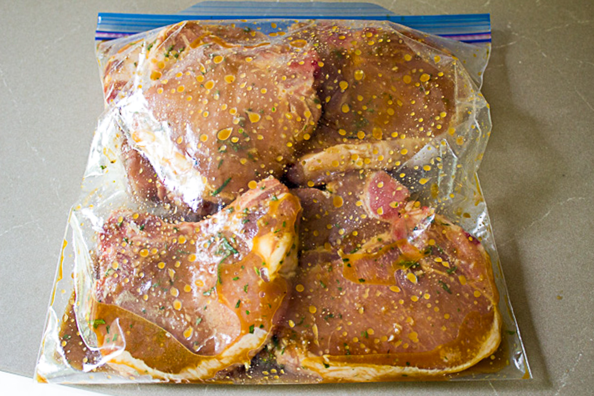 pork chops in ziploc bag with marinade.