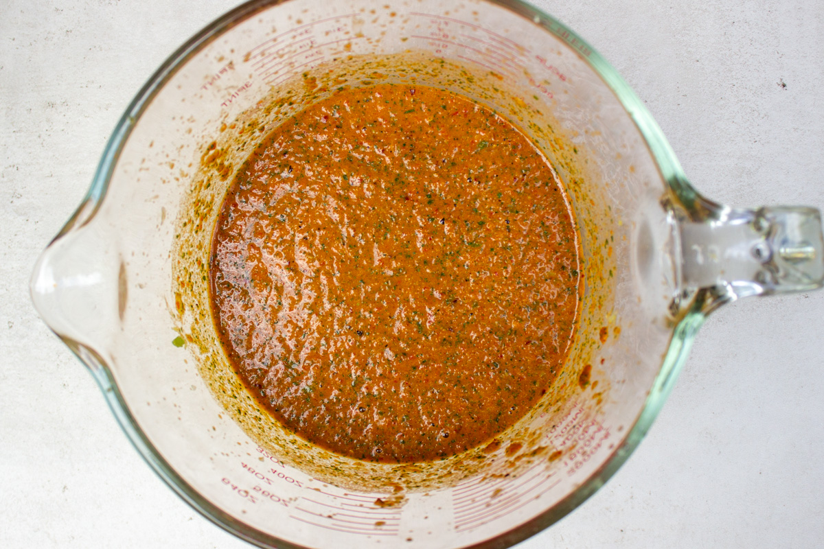 blended spicy sauce in measuring bowl.