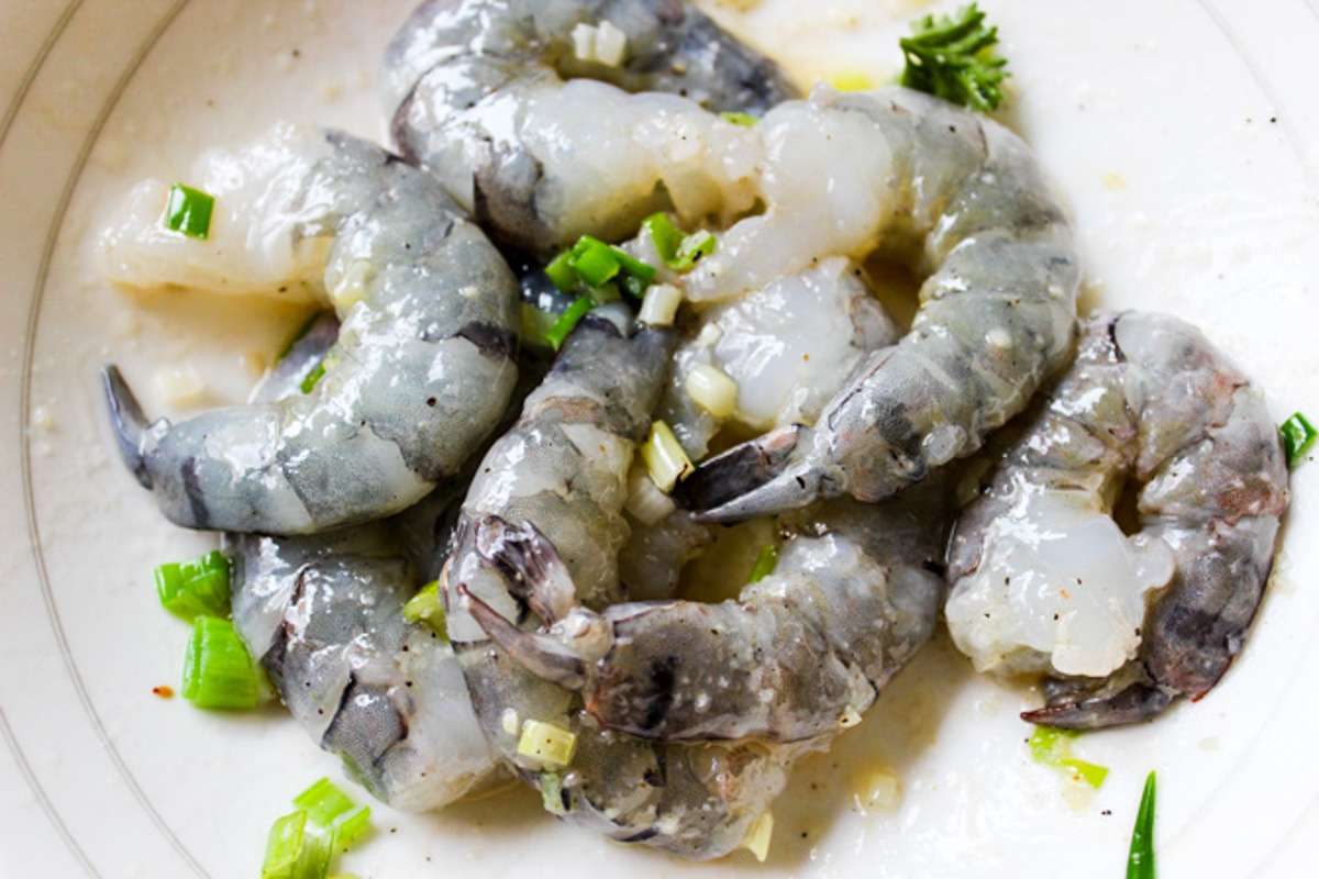shrimp tossed in oil, green onions, garlic.