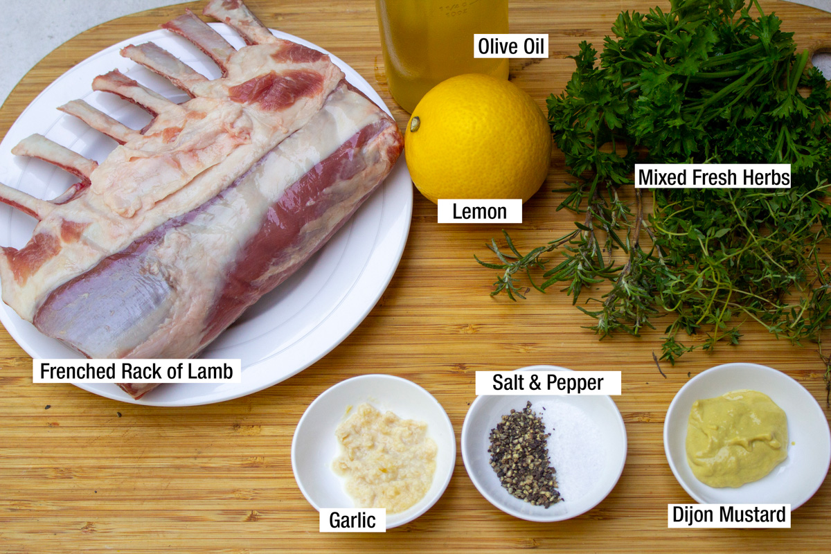 raw rack of lamb, lemon, mixed fresh herbs, garlic, salt, pepper, oil..