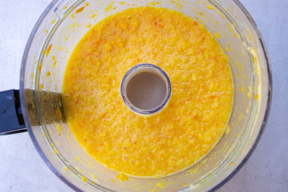 orange and zest blended in food processor bowl.
