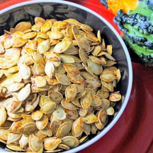 seasoned roasted pumpkin seeds in bowl.