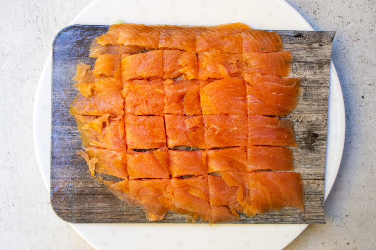 smoked salmon sliced into small squares.