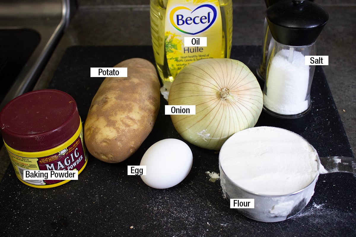 Potato (regular and/or sweet potato), oil, flour, baking powder, egg, onion, salt.