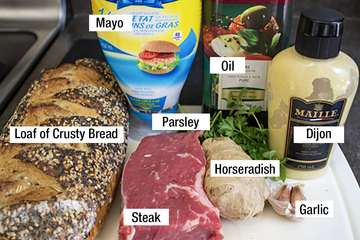 steak, mayo, loaf of crusty bread, dijon, oil, garlic, horseradish, parsley.