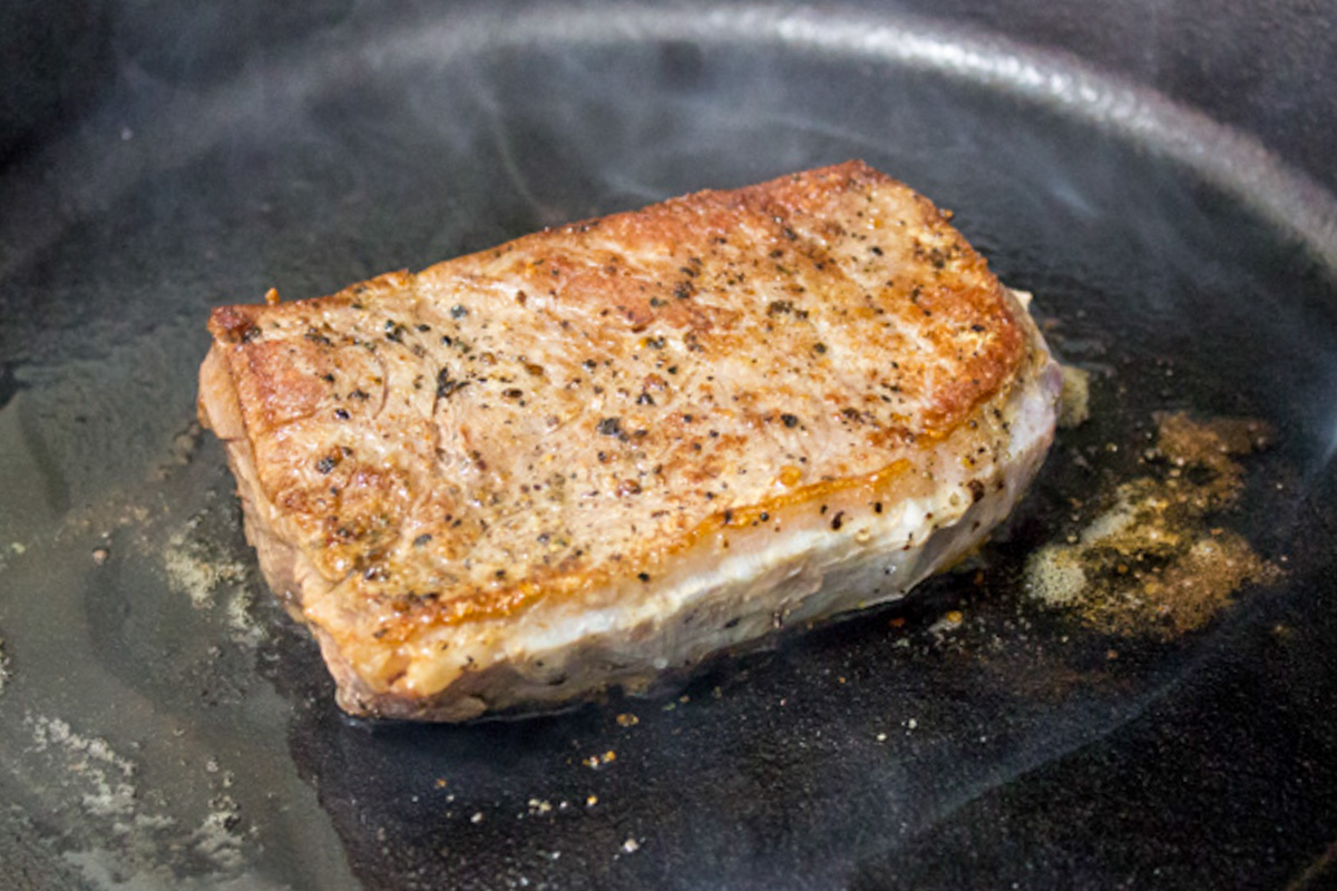 sous vide steak searing in pan.