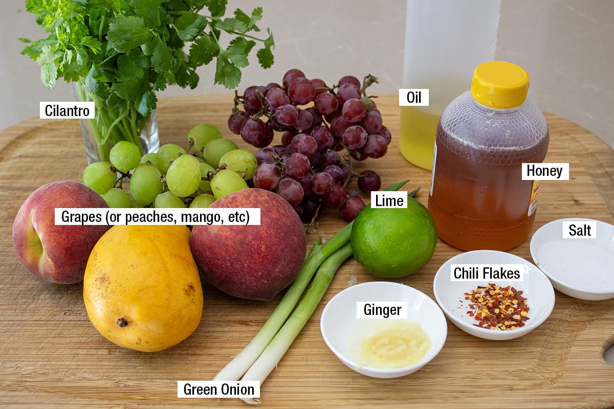 grapes (or peaches, mango, etc), oil, honey, ginger, chili flakes, cilantro, lime, green onion, salt.